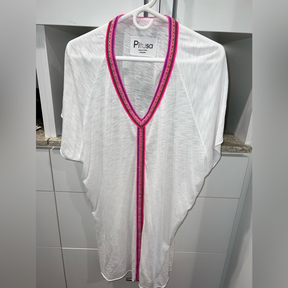 One size fits all beach coverup. Like new condition.